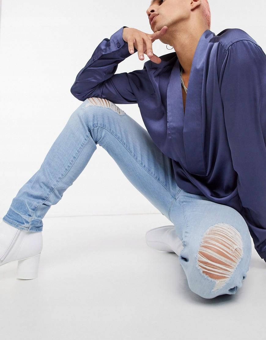 SPODNIE JEANS PRZETARCIA