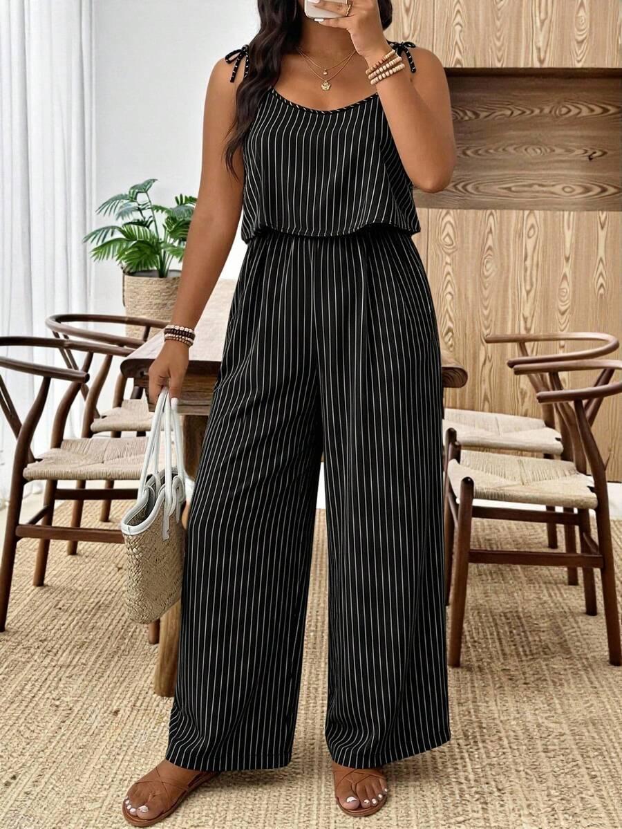 czarny kombinezon wzór paski