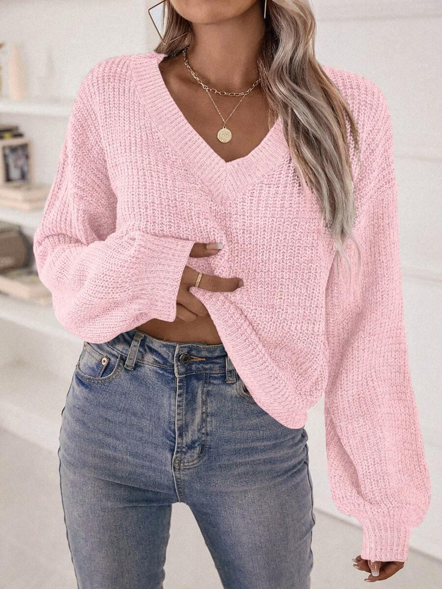 różowy sweter v-neck