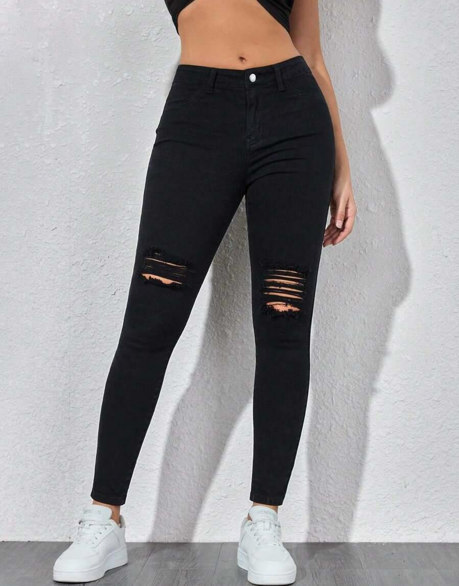 CZARNE SPODNIE JEANS PRZETARCIA 