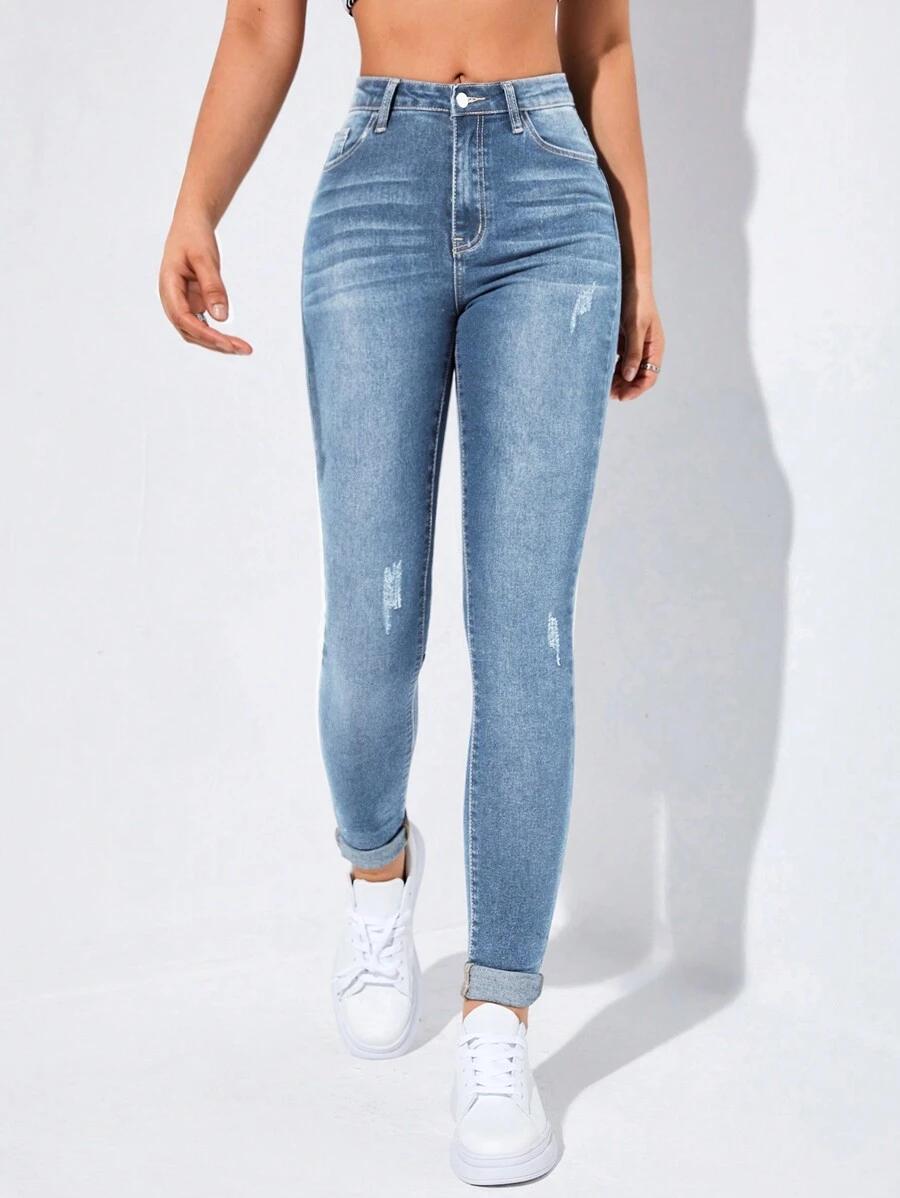 NIEBIESKIE SPODNIE JEANS PRZETARCIA