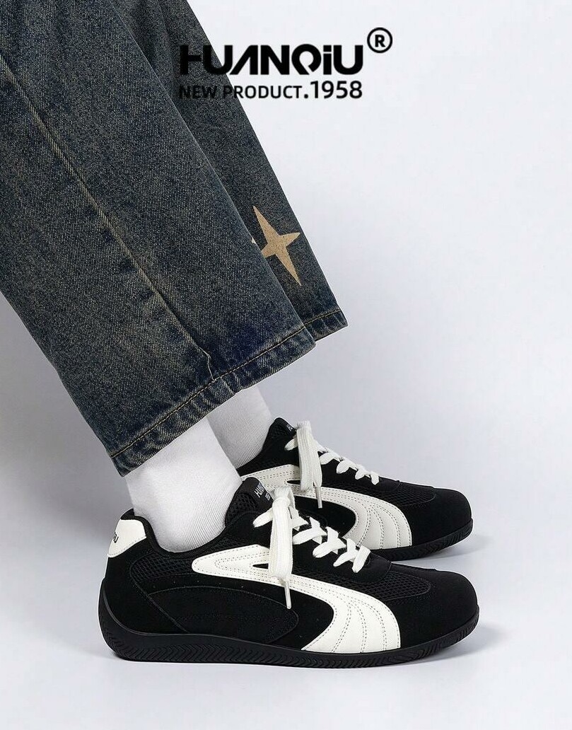 sznurowane czarne buty sportowe