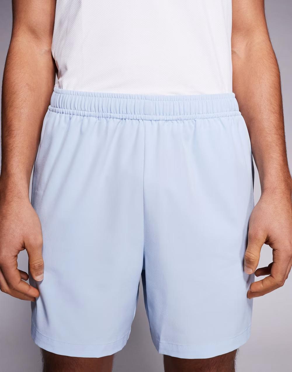 niebieskie spodenki sportowe kieszenie