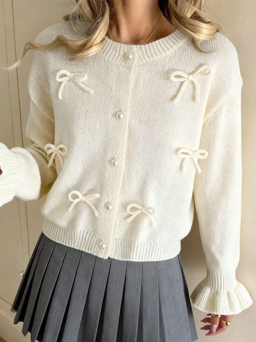 kremowy dzianinowy sweter