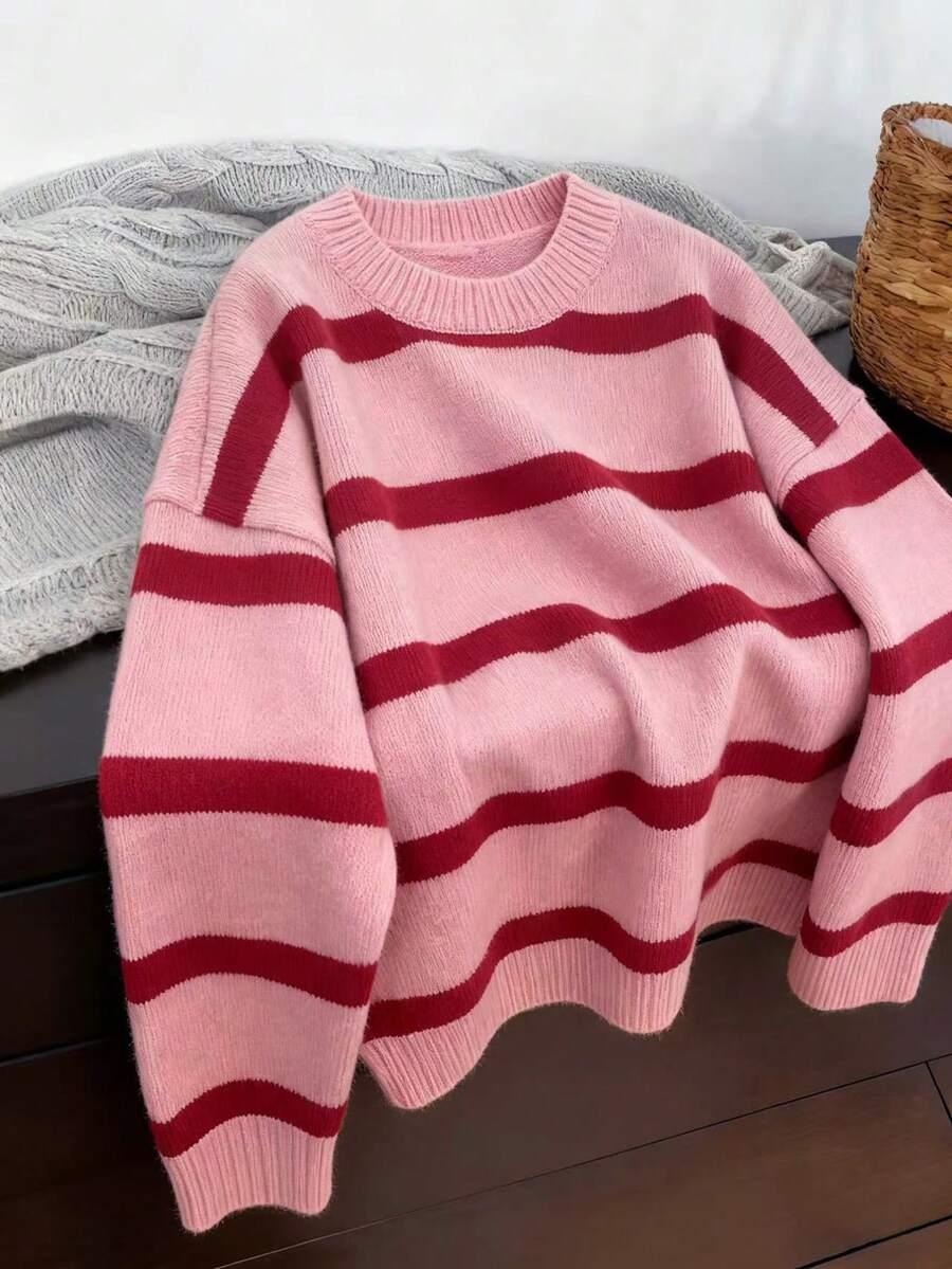 RÓŻOWY SWETER PASKI