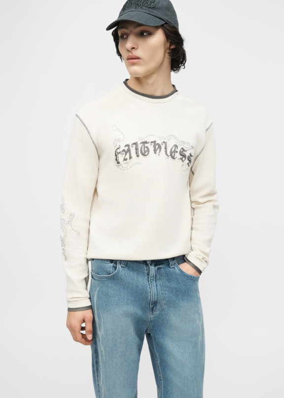 niebieskie spodnie jeans nadruk zamek kieszenie