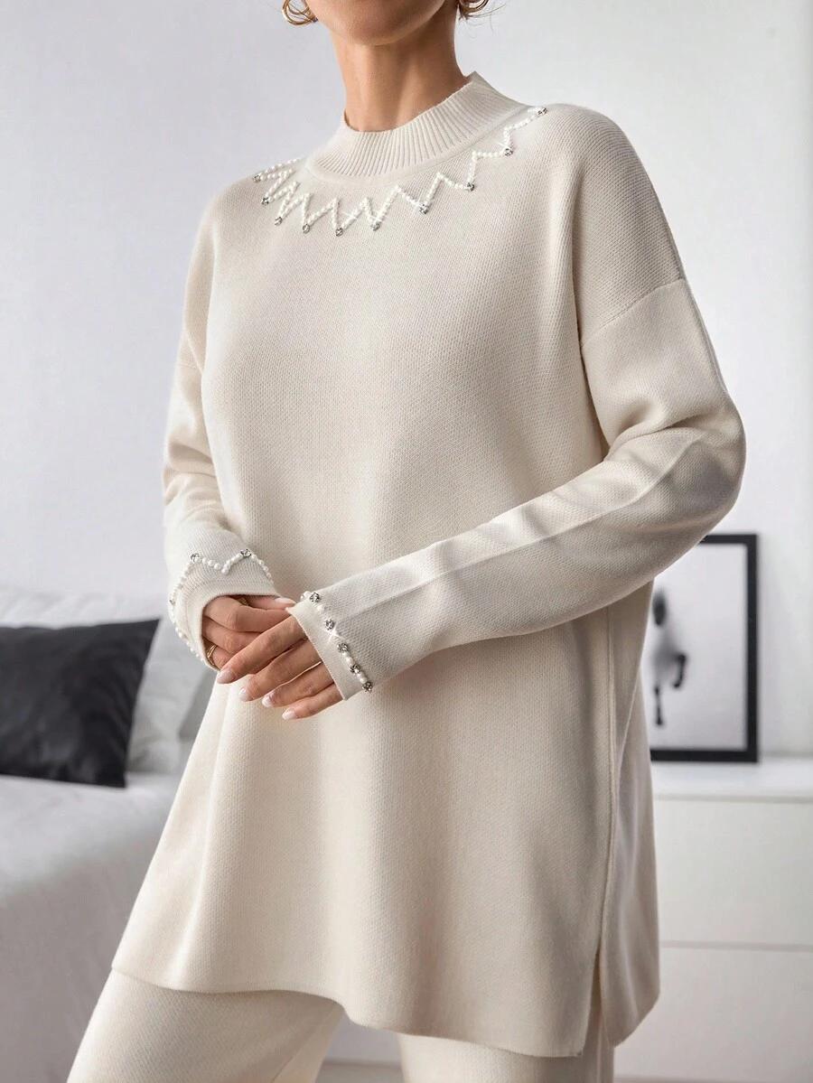 kremowy dzianinowy sweter 