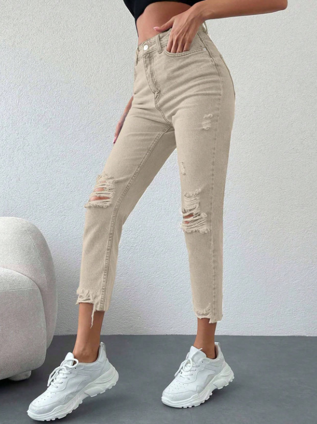 BEŻOWE SPODNIE JEANS PRZETARCIA