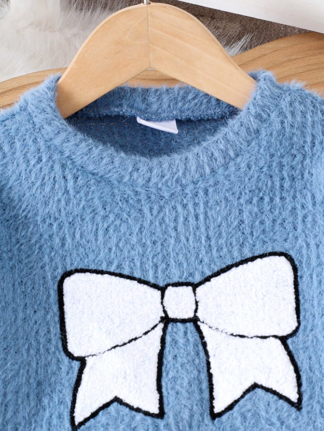 niebieski sweter kokarda 