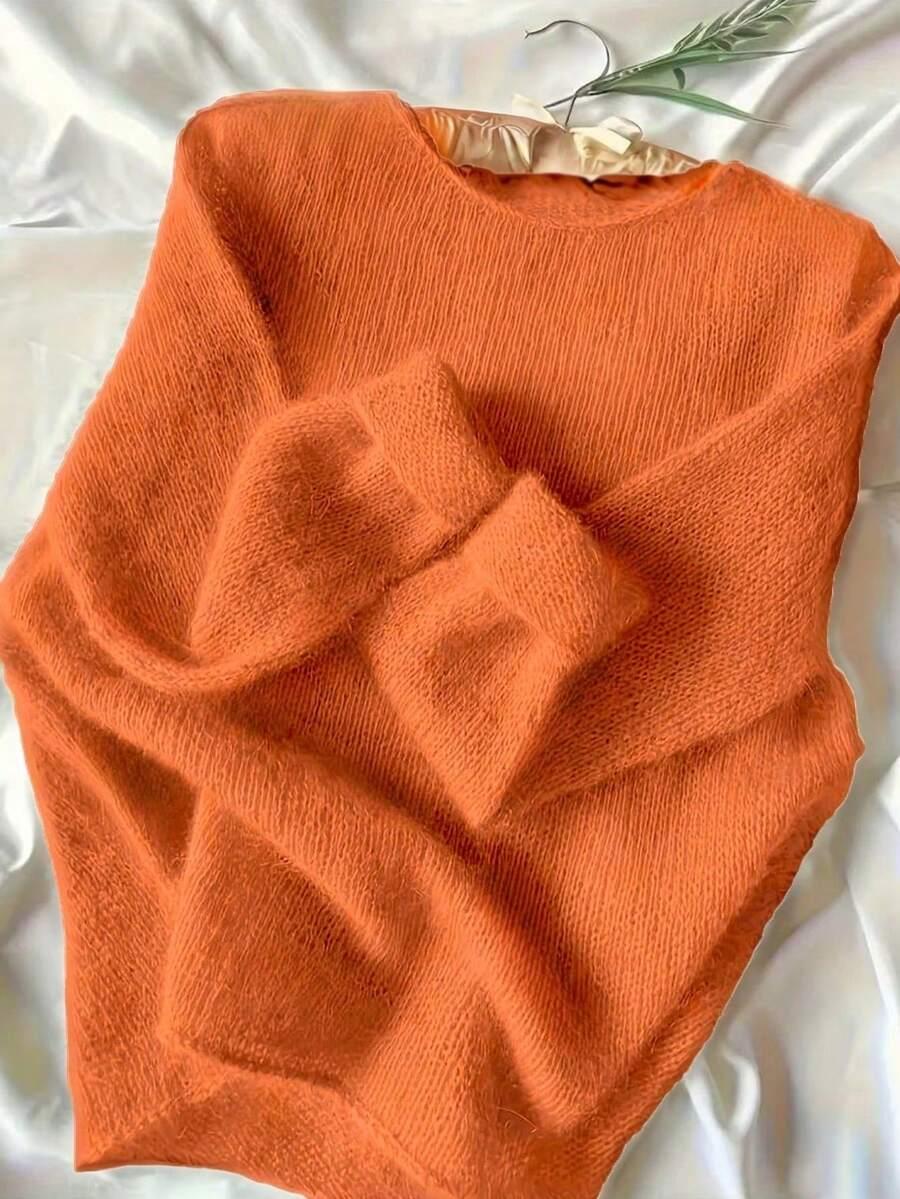 pomarańczowy sweter okrągły dekolt
