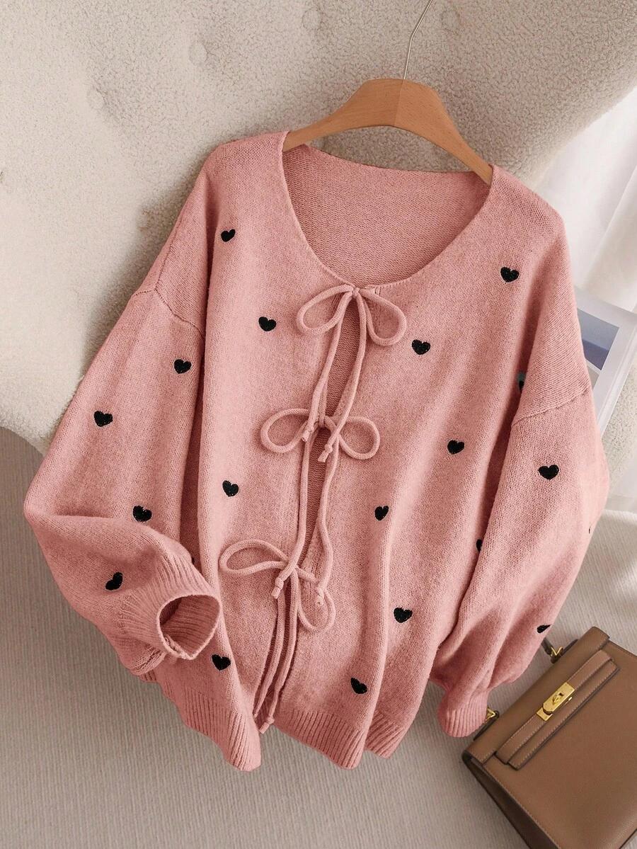 różowy sweter wiązanie