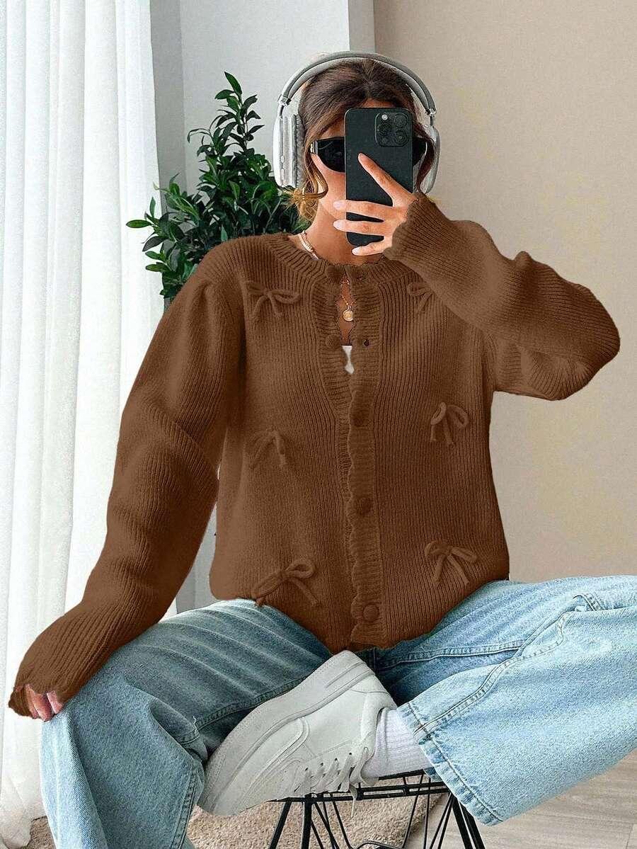 rozpinany brązowy sweter kokardki