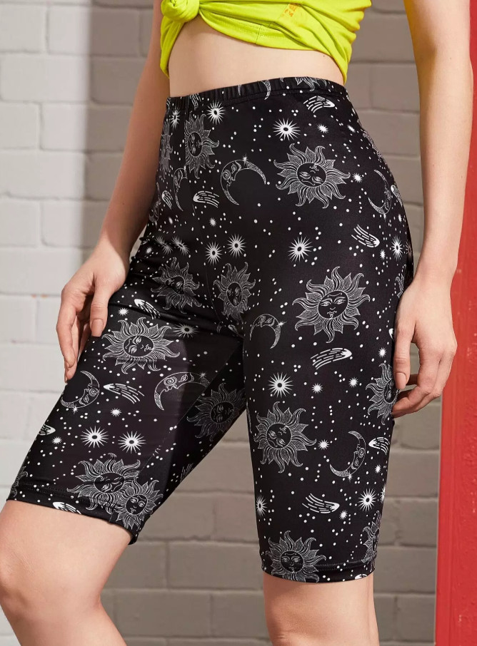 czarne legginsy przed kolano wzór