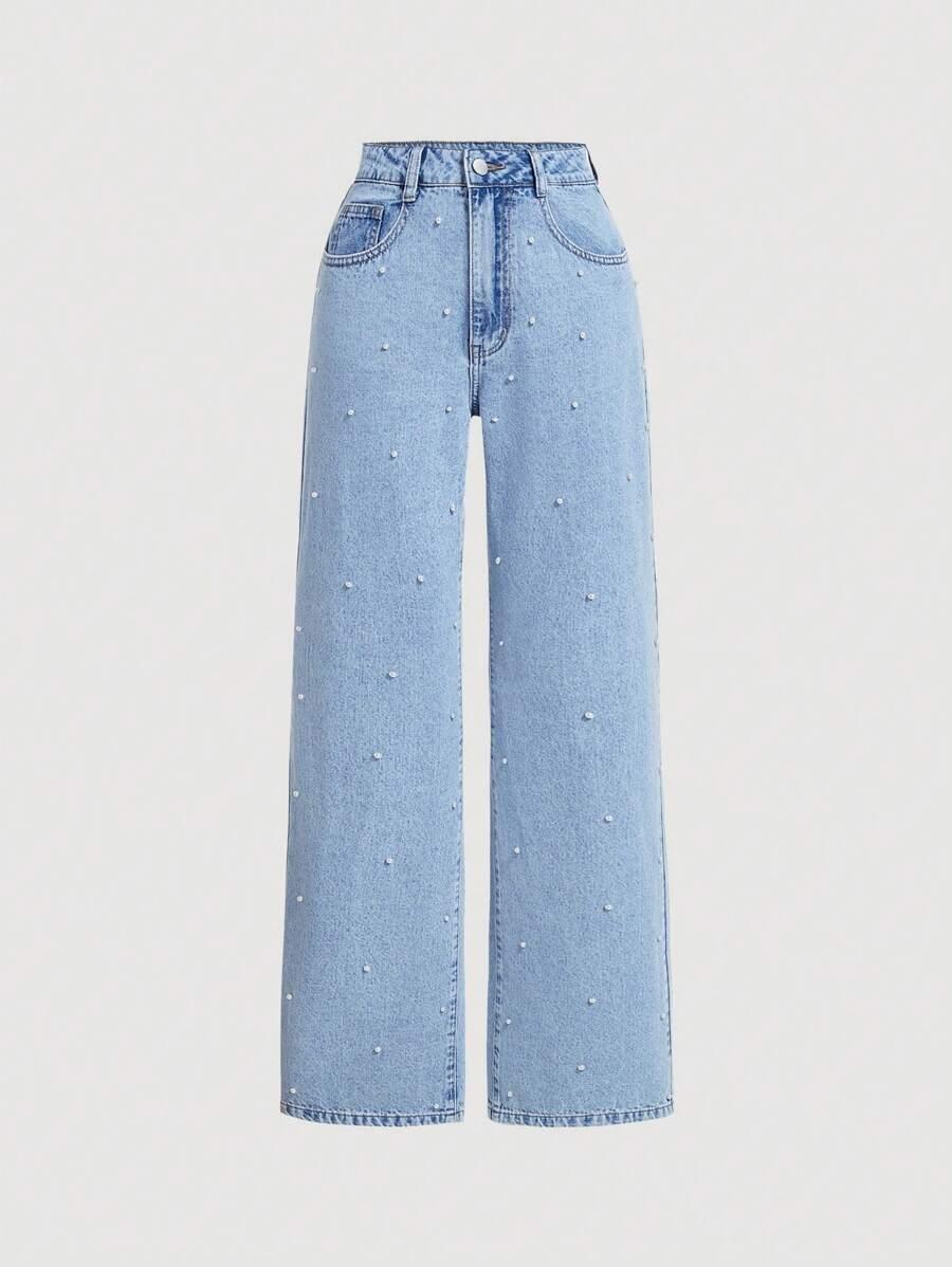 niebieskie spodnie jeans 