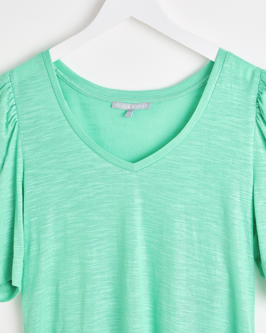 zielona bluzka v-neck bufki połysk