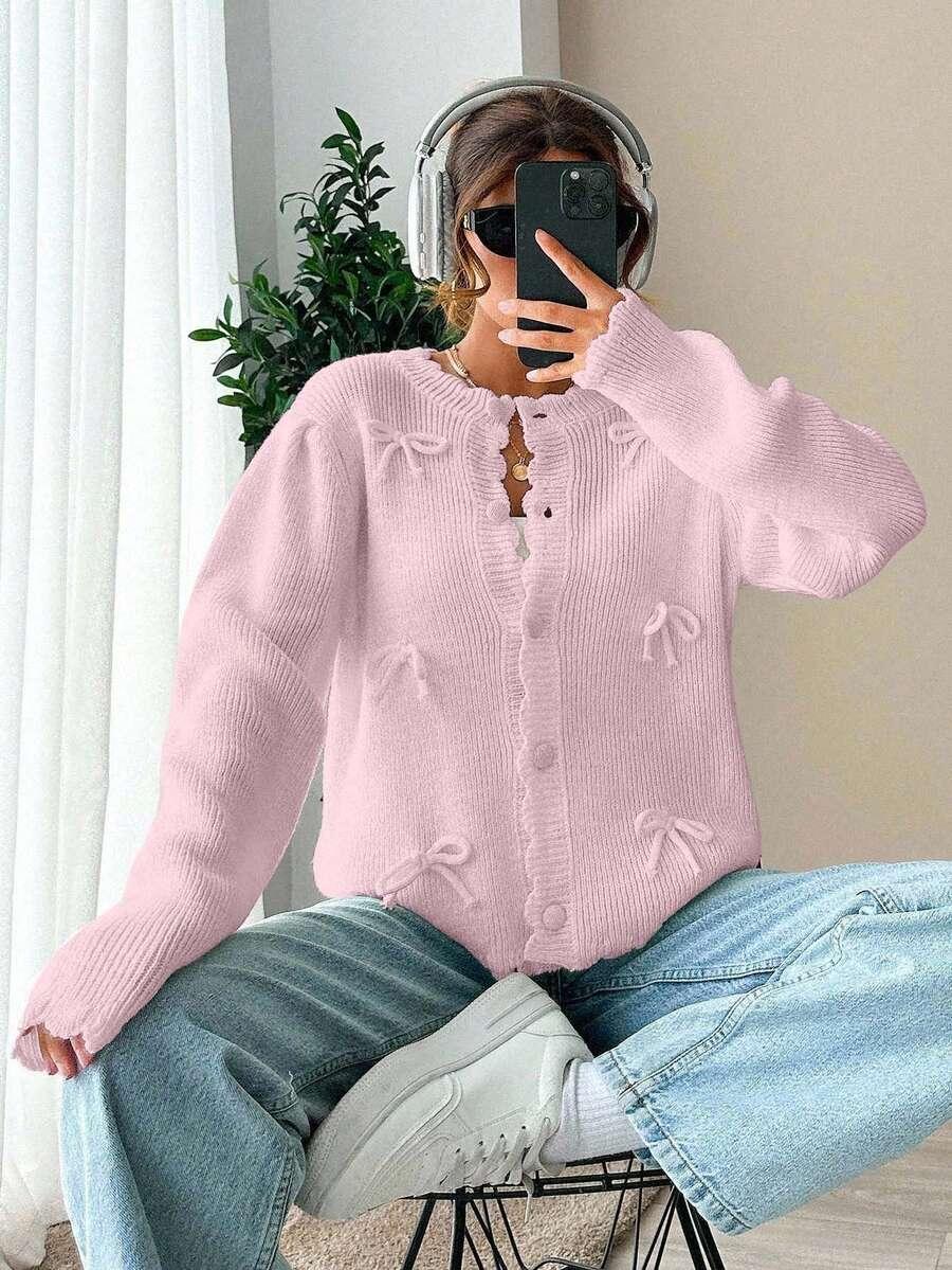RÓŻOWY SWETER GUZIKI