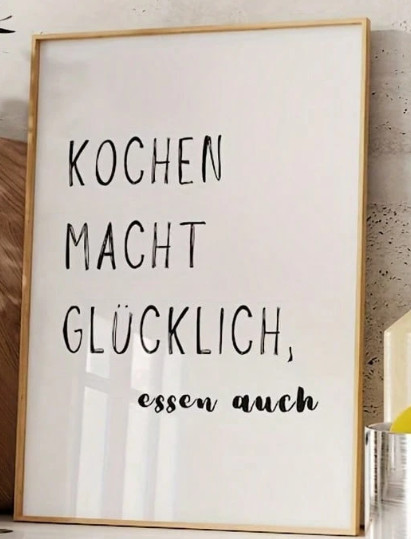 plakat  napis kochen macht glucklich essen auch