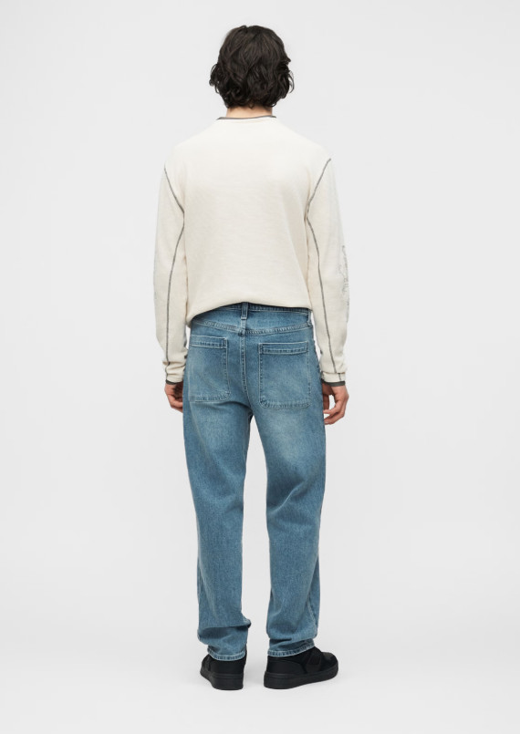 niebieskie spodnie jeans nadruk zamek kieszenie