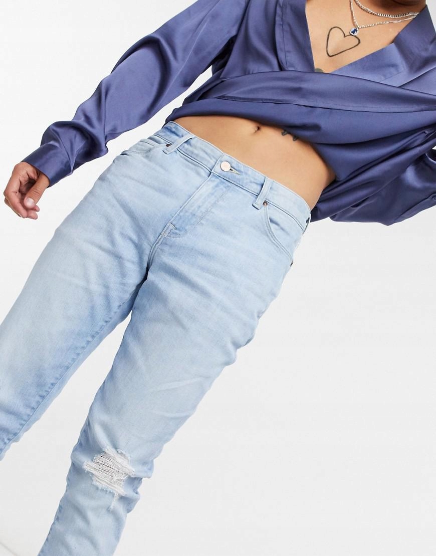 SPODNIE JEANS PRZETARCIA