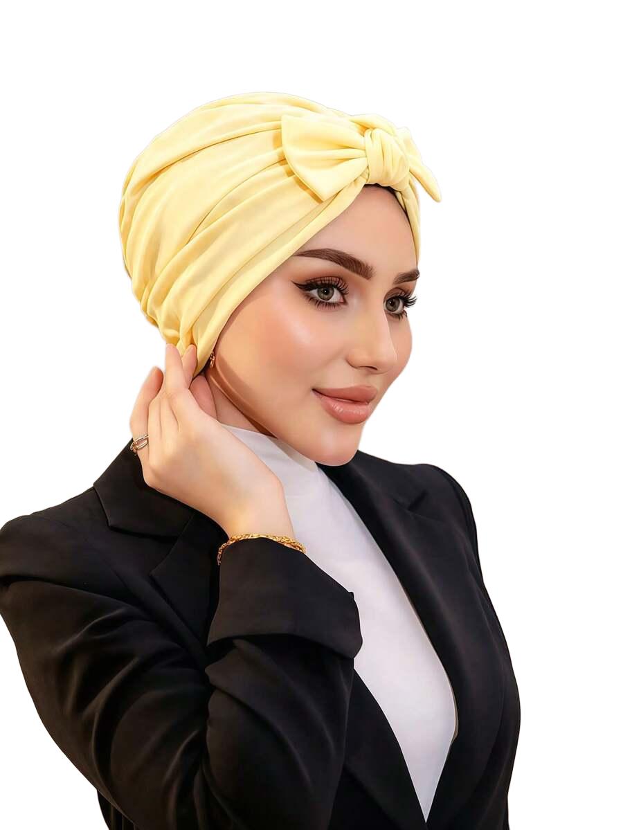 żółty turban kokarda