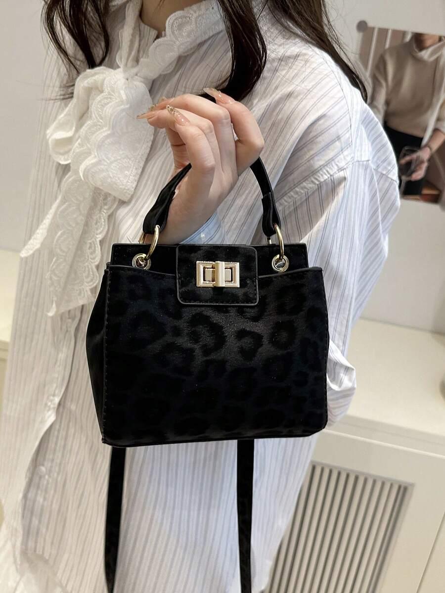 czarna torebka animal print