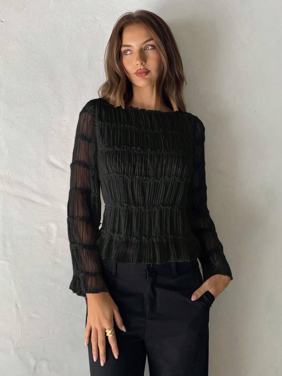 czarna bluzka falbanki
