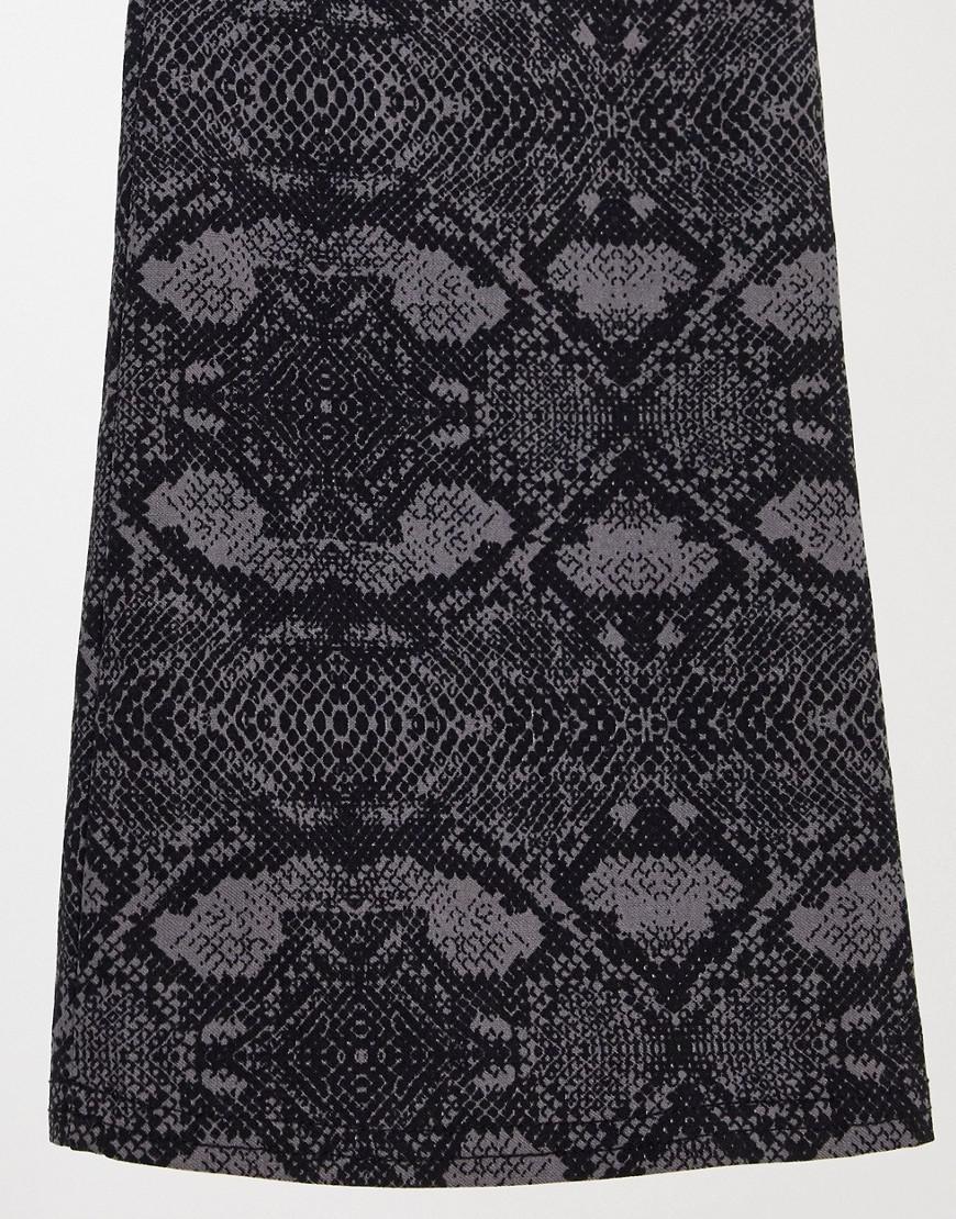 SPODNIE dzwony animal print