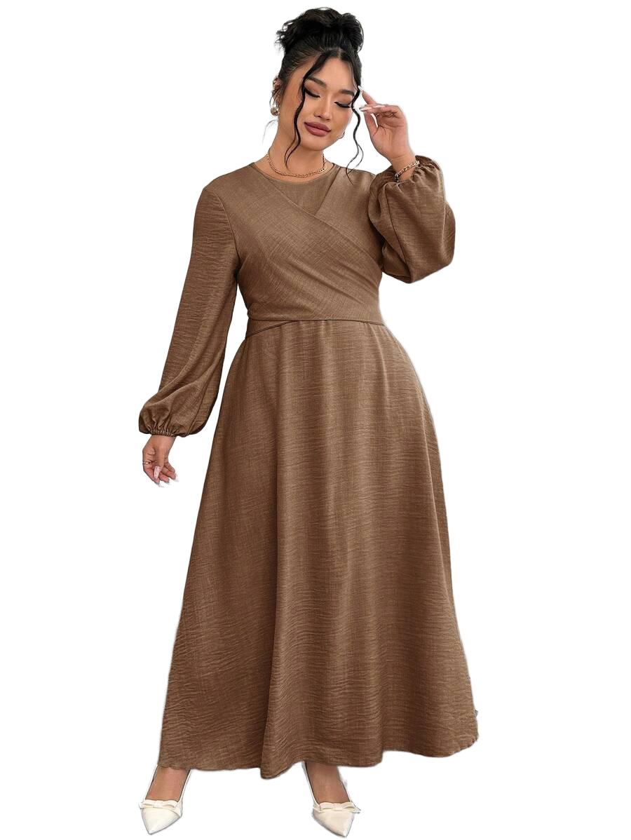 SUKIENKA PLUS SIZE ROZKLOSZOWANA MIDI DŁUGI RĘKAW