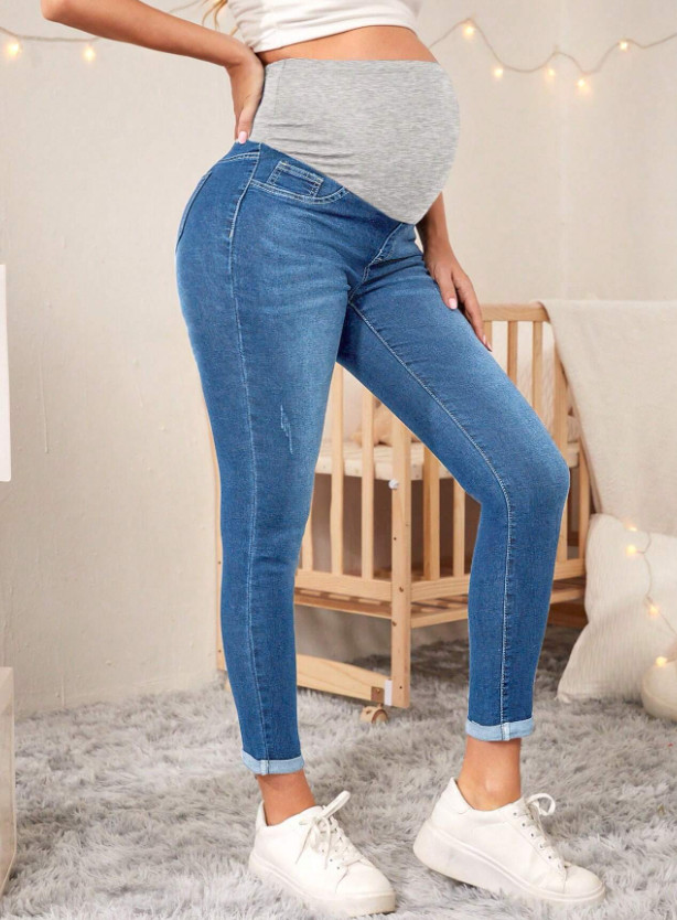 CIĄŻOWE SPODNIE JEANS