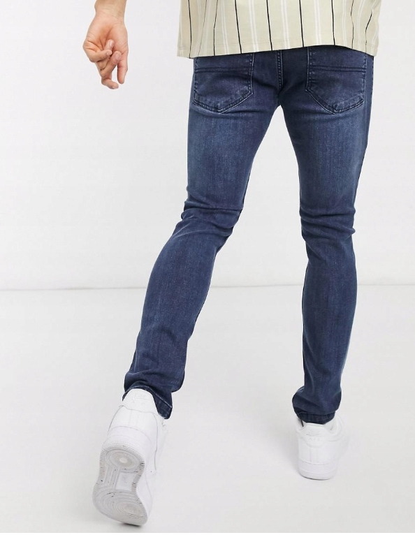 niebieskie spodnie jeans kieszenie