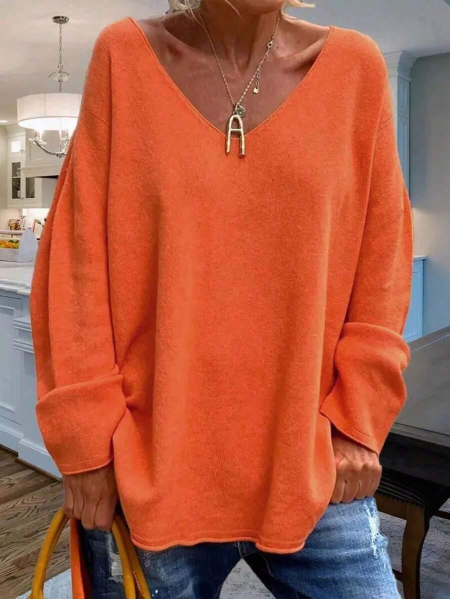pomarańczowy sweter v-neck