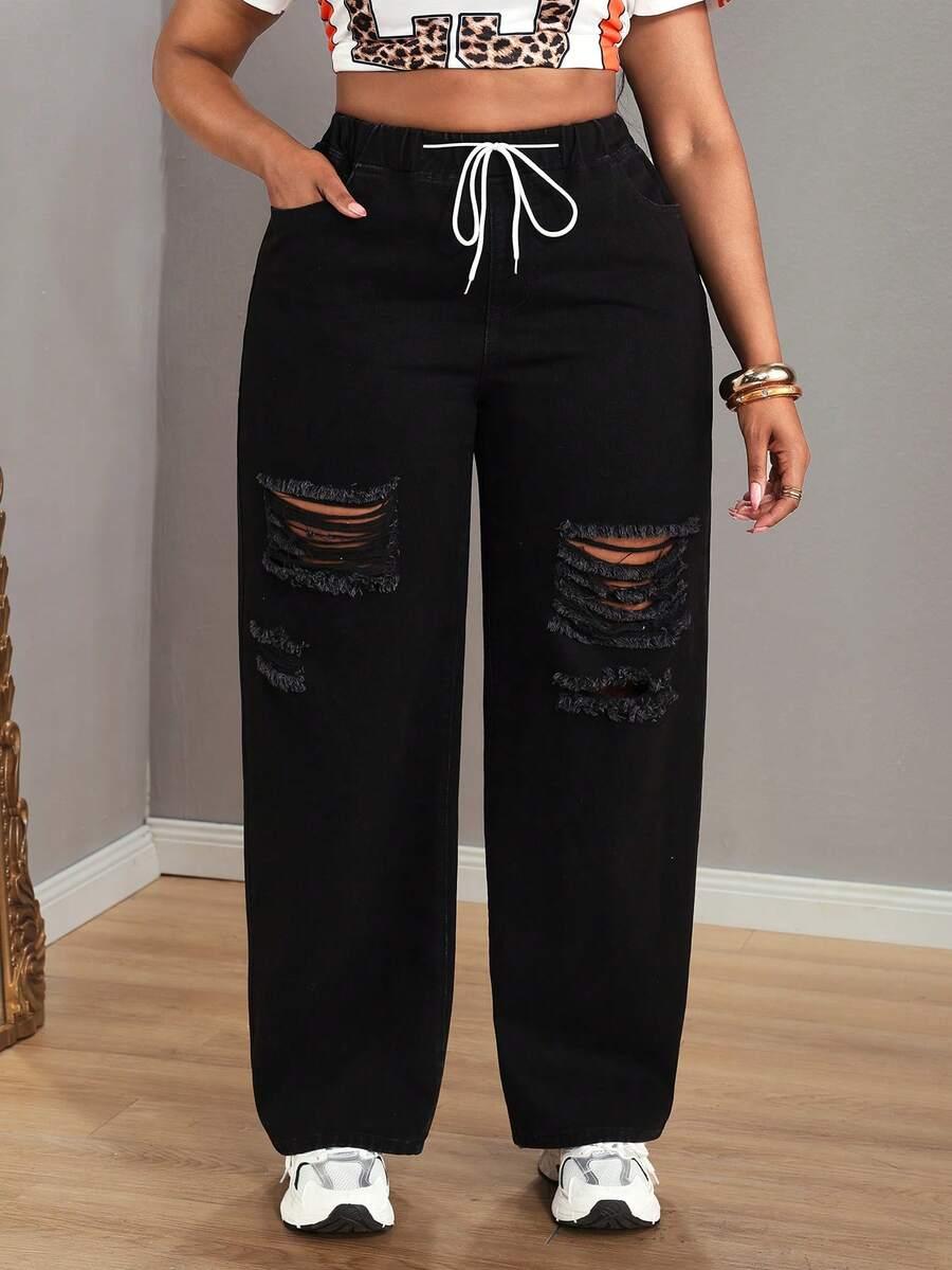 czarne spodnie jeans 
