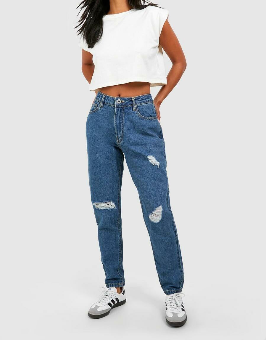 SPODNIE JEANS PRZETARCIA 