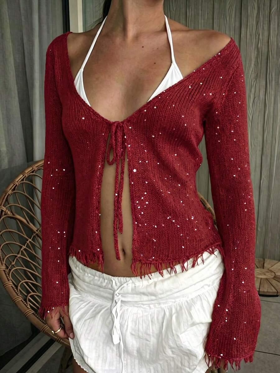 czerwony sweter zdobienia