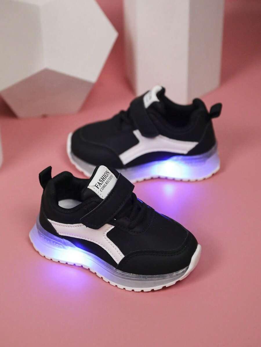 czarne świecące buty sportowe