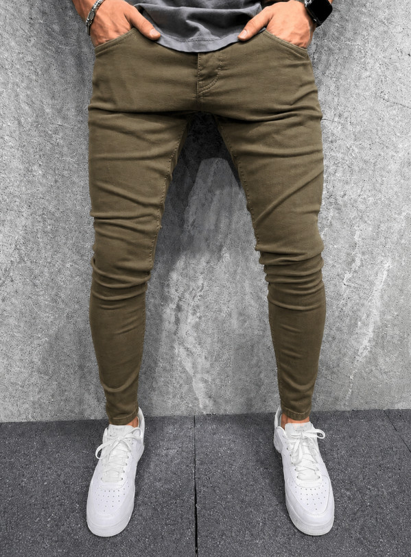 zielone spodnie rurki jeans kieszenie zamek