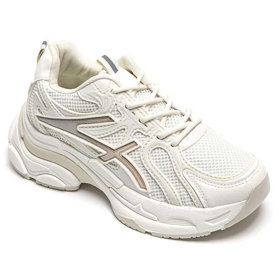 kremowe buty sportowe