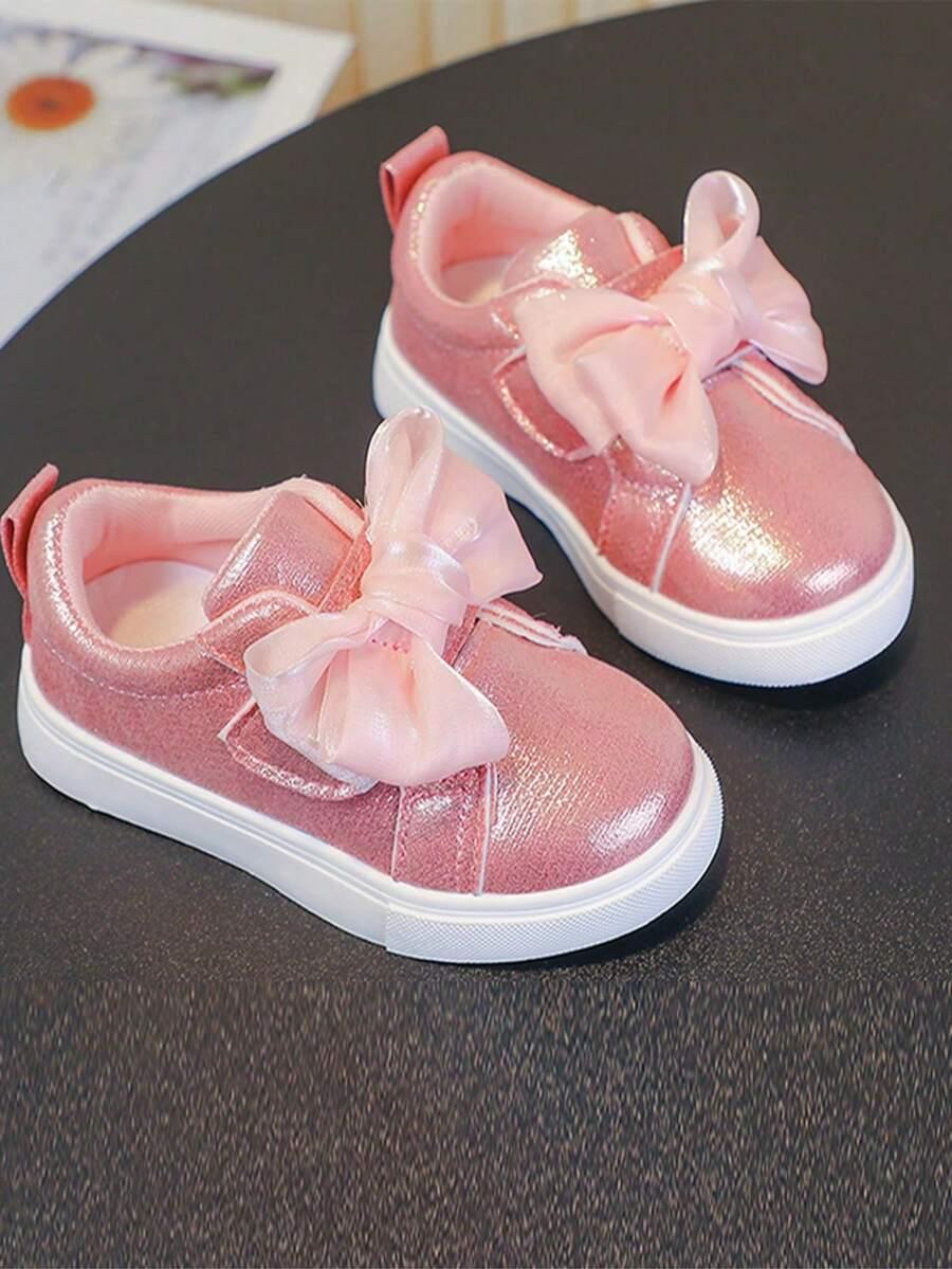 różowe buty sportowe