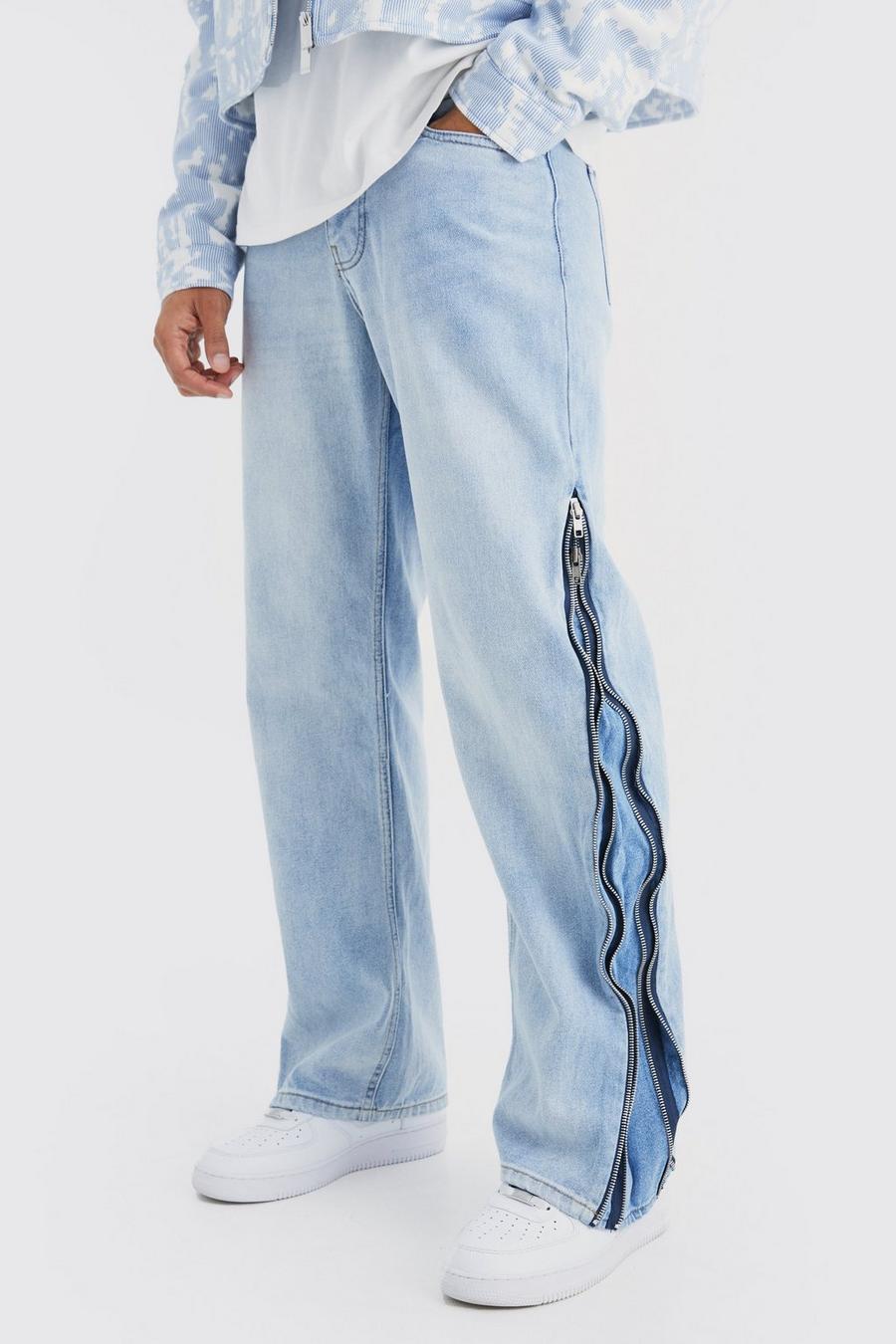 niebieskie spodnie jeans guziki kieszenie zamki