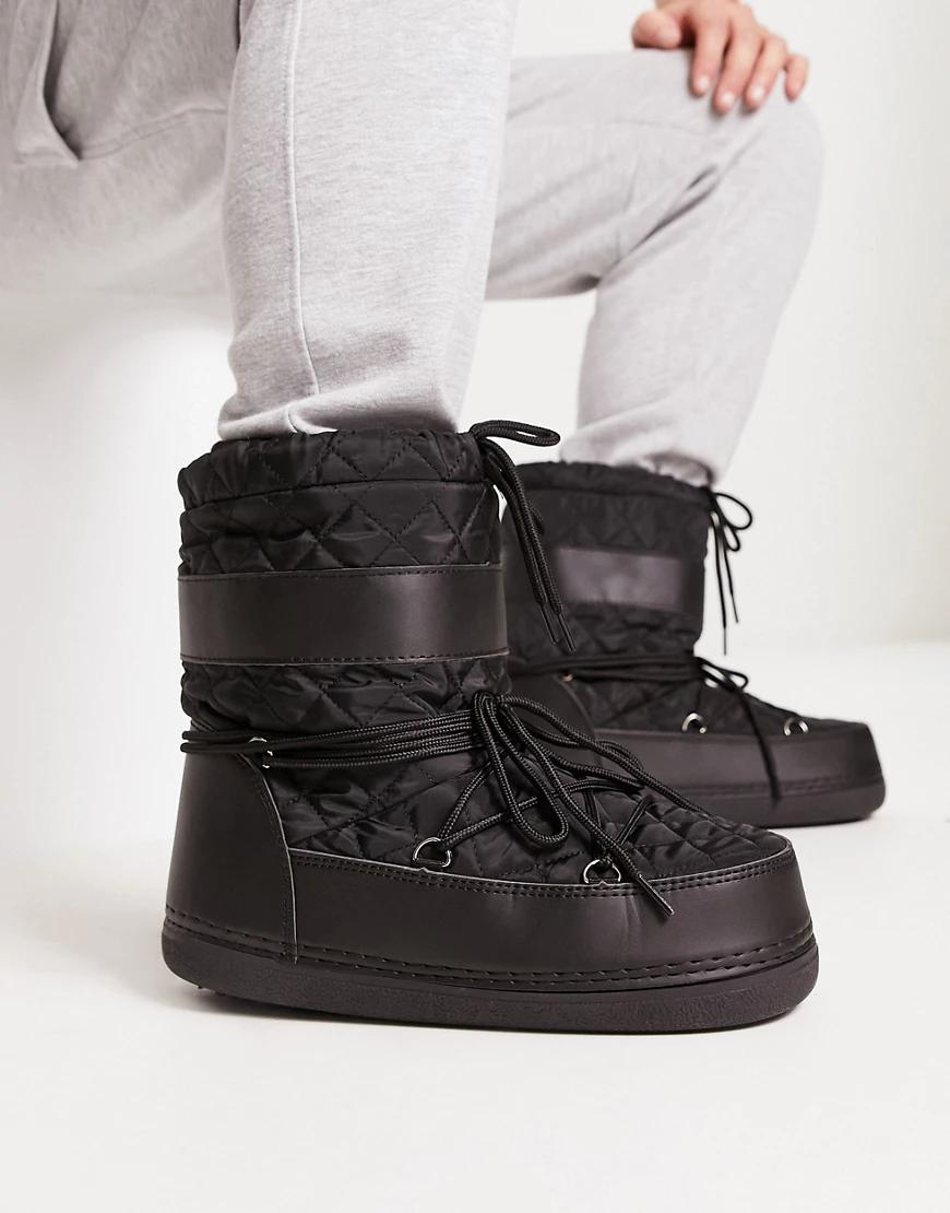 czarne pikowane buty śniegowce wiązanie