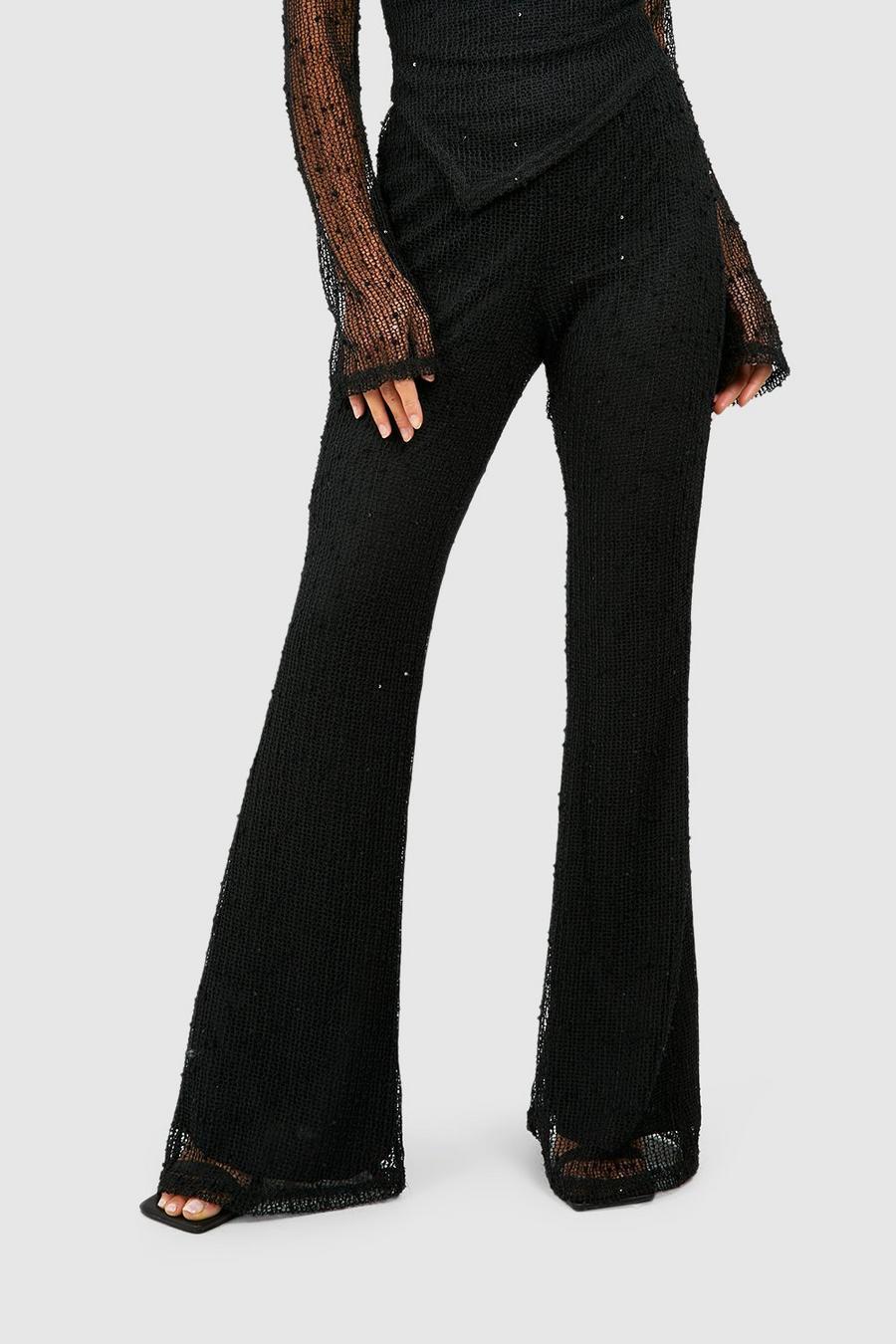 czarne rozszerzane spodnie siateczka