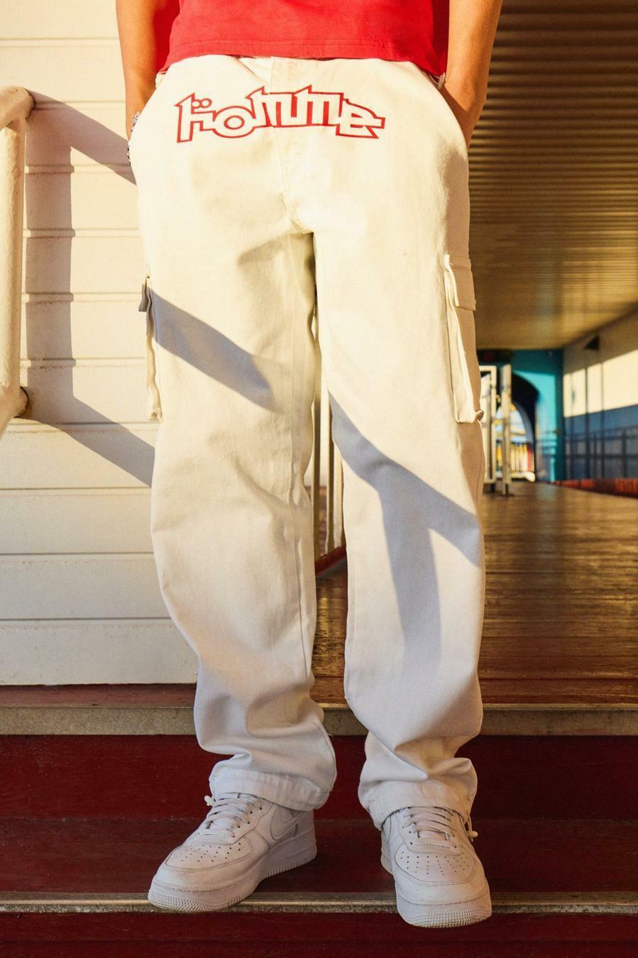 białe proste spodnie jeans cargo kieszenie nadruk