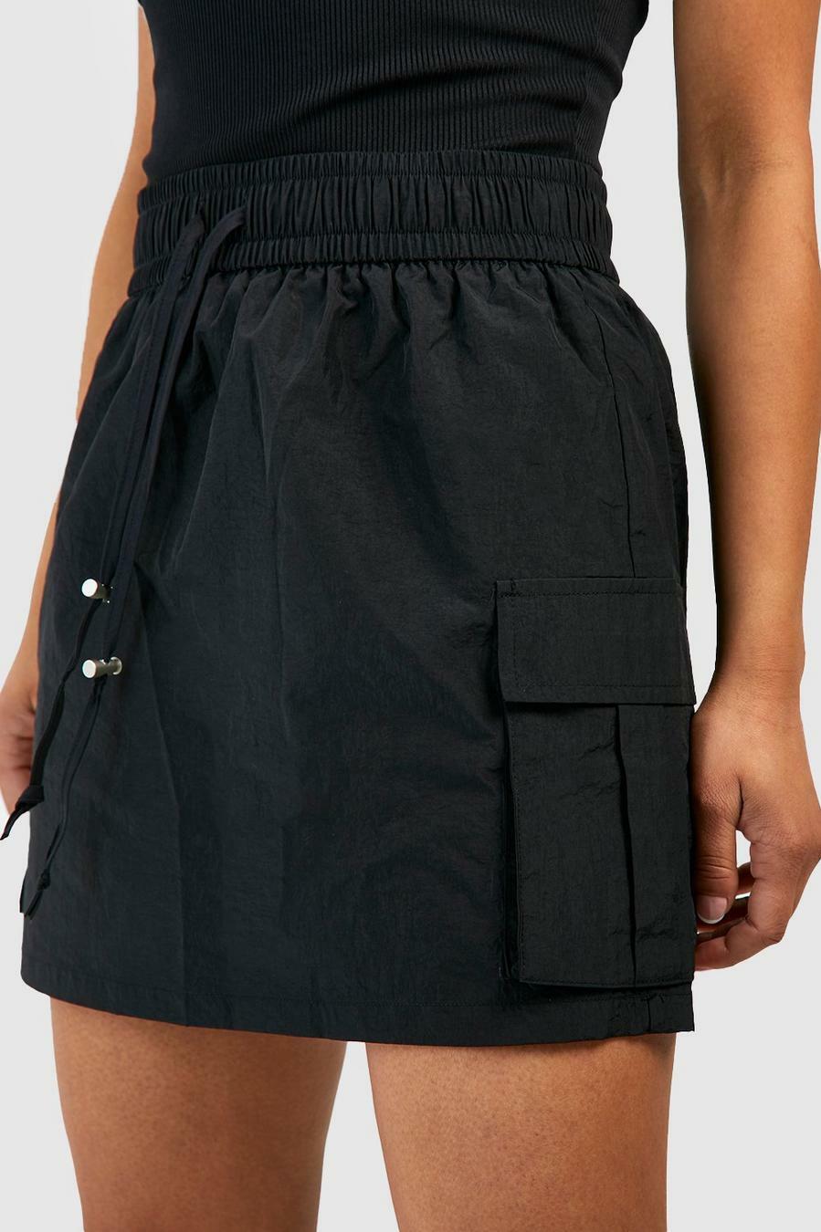 czarna mini spódnica z gumką w pasie kieszenie