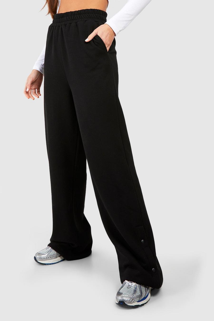 czarne spodnie dresowe joggery rozpinane nogawki 