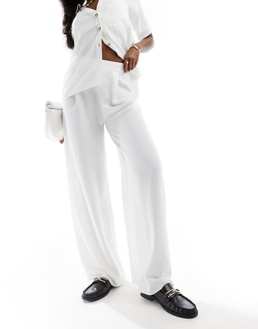 białe szerokie spodnie casual wysoki stan