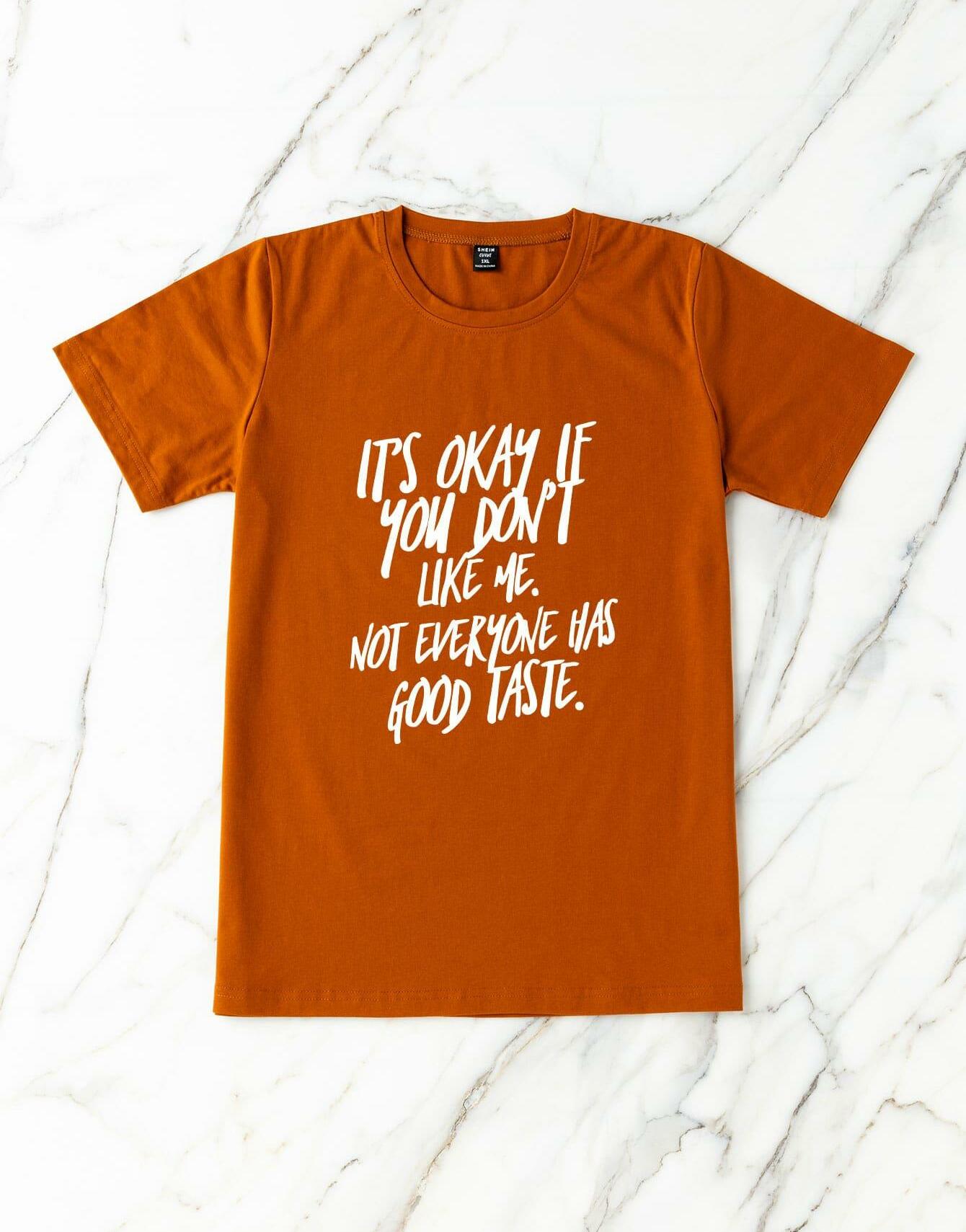 pomarańczowy luźny t-shirt napis