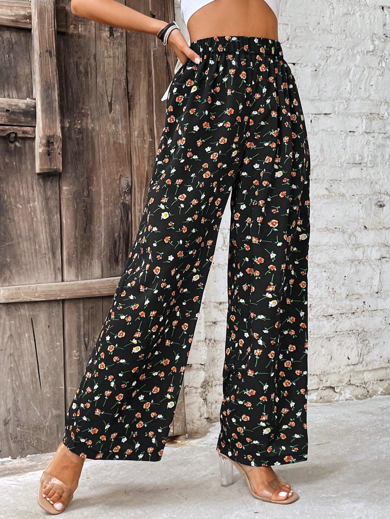 czarne spodnie z wysokim stanem kwiaty wzór casual