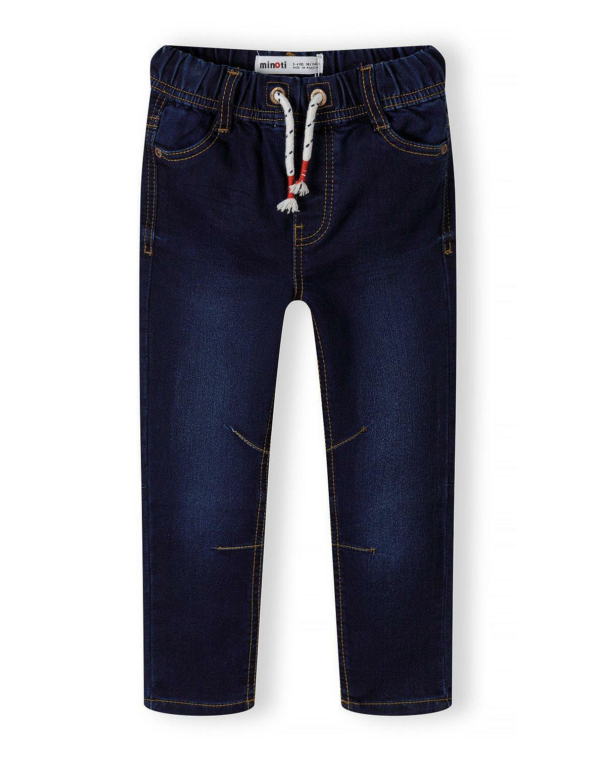 przecierane spodnie rurki jeans na gumce