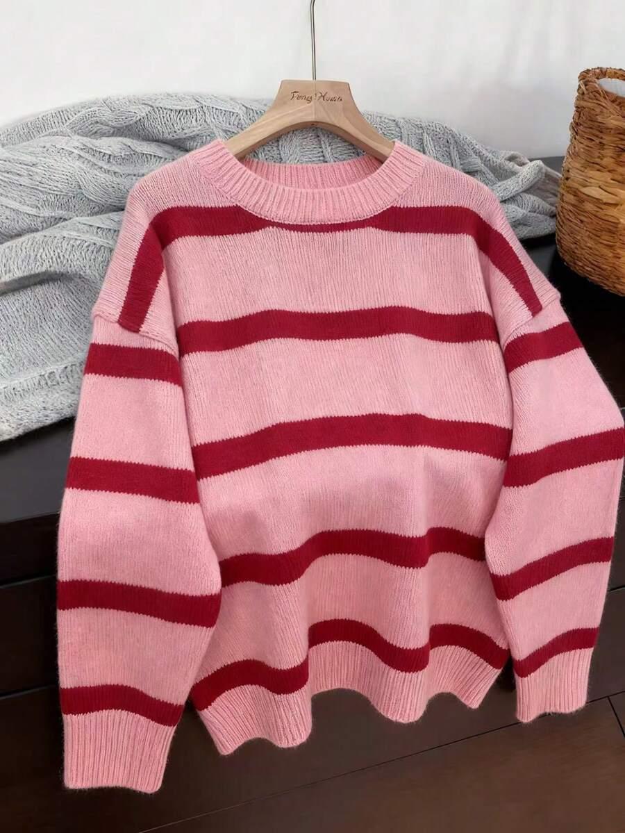 RÓŻOWY SWETER PASKI