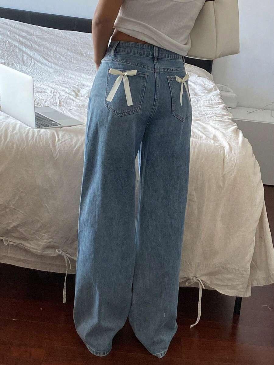 SPODNIE JEANS WYSOKI STAN KOKARDY 